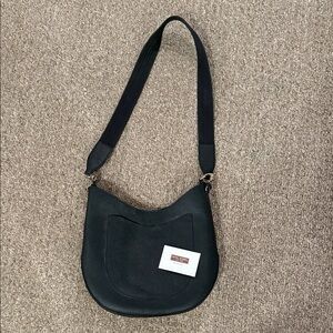 Henri Bendel
Black guitar strap crossbody bag